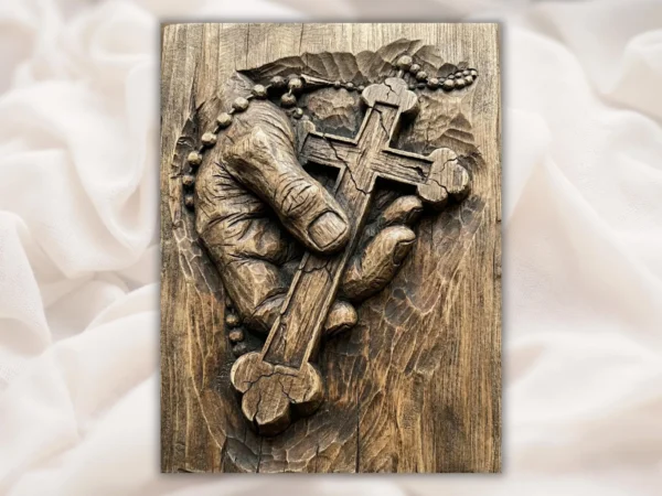 Hand Holding Cross
